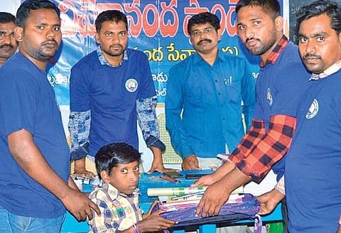 They are adopting schools to distribute study material, improving school infrastructure, planting saplings and helping the needy through various activities. 