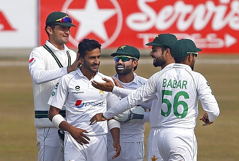 Pakistan's Hasan Ali, second left, celebrates with teammates after taking wicket of SAfrica's Aiden Markram during second test match at the Pindi Stadium in Rawalpindi, Pakistan. (Photo | AP)