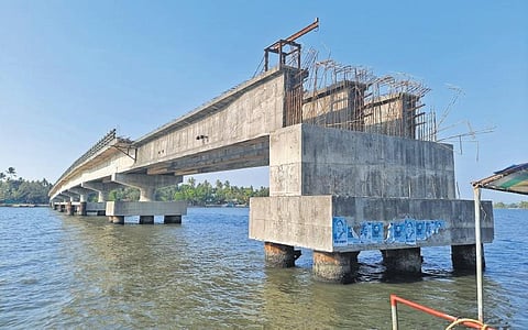 Chathanad Kadamakudy bridge in Valiya Kadamakudy ward is still only  half-way done