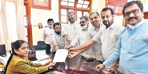 Congress Council Chairman candidate Naseer Ahmed submits his nomination papers to the election officer at Vidhana Soudha on Monday