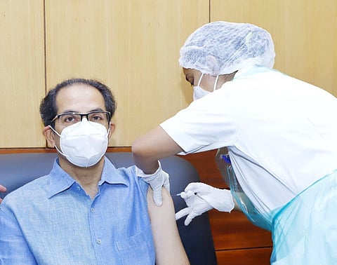 Maharashtra CM Uddhav Thackeray receiving the first dose of coronavirus vaccine. (Photo | Uddhav Thackeray, Twitter)