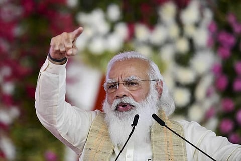 Prime Minister Narendra Modi speaks during the flag-off ceremony of the Dandi March or Salt Movement to celebrate the 75th anniversary of India's Independence in Ahmedabad. (Photo | PTI)
