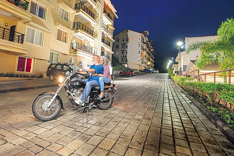 A senior couple staying at Ashiana Utsav, Lavasa, pose before venturing out to explore the city
