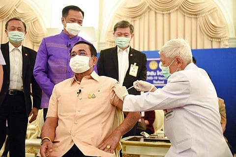 Thailand's Prime Minister Prayuth Chan-ocha, front left, receives a shot of the AstraZeneca's COVID-19 vaccine at government house in Bangkok, Thailand. (Photo | AP)