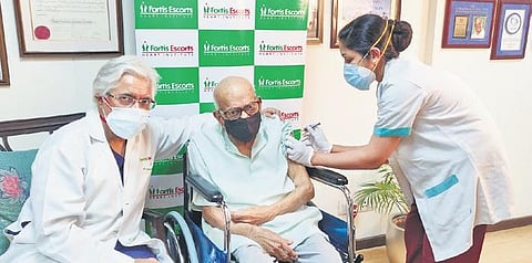 Kewal Krishan gets the Covid jab at Fortis Hospital in Delhi on Monday. (Photo | PTI)