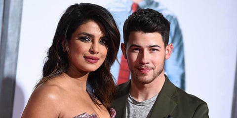 Actress Priyanka Chopra with her pop star husband Nick Jonas (Photo | AP)