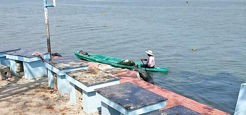 A resident involved in crab fishing in Vembanad lake between Thevara and Ambalakadavu ward in Nettoor