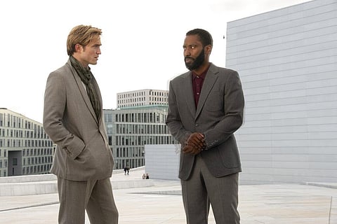 Robert Pattinson, left, and John David Washington in a scene from 'Tenet.' (Photo | AP)