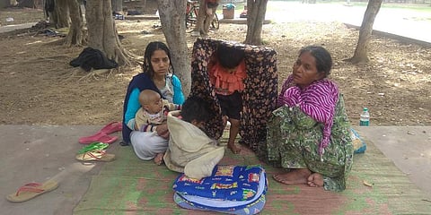 They gave birth amid the lockdown in Barakhamba park after being turned away by multiple hospitals, and remain uncertain if they would ever have homes. (Photo | EPS)