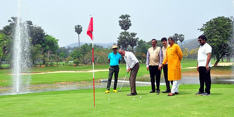 Indian Golf Union president Lt Gen  D Anbu (Retd) tees off at the East Point Golf Club in Visakhapatnam. (Photo| G Satyanarayana, EPS)