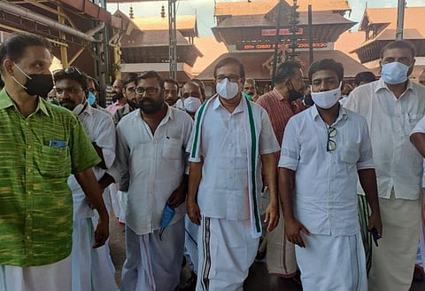 IUML candidate KNA Khader (Centre) at the eastern nada of Guruvayur Sree Krishna Temple before kickstarting his election campaign on March 15 | Express 