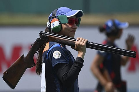 Rajeshwari Kumari of India competes in the women's trap team final of the ISSF World Cup 2021, at the Karni Singh Shooting Range in New Delhi on March 28, 2021. (Photo | AFP)