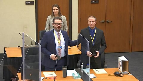 In this image taken from video, defense attorney Eric Nelson, left, defendant and former Minneapolis police officer Derek Chauvin, right, can be seen. (Photo | AP)