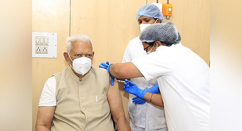 Governor Vajubhai Vala taking Covid jab