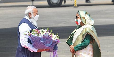 PM Narendra Modi arrives in Bangladesh, where he was welcomed by PM Sheikh Hasina. (Photo | Narendra Modi Twitter)