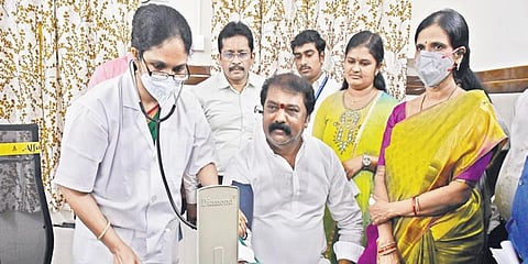 Labour Minister Gummanur Jayaram gets his BP checked after inaugurating the model ESI dispensary in Vijayawada. (Photo| Prasant Madugula, EPS)
