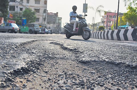 Eluru Road turns a nightmare  for motorists | P Ravindra Babu