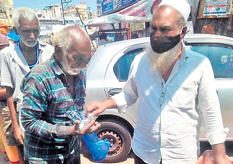Arrahmaan Imdaad Welfare Society distributes food packets to the poor;  