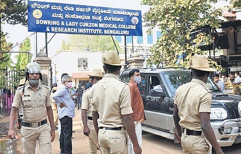 Police outside the Bowring Hospital in Bengaluru where the woman allegedly involved in the CD row was subjected to medical tests, on Wednesday| Vinod kumar T