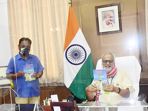 Governor Prof Ganeshi Lal releasing the book on Dongria Kondh.