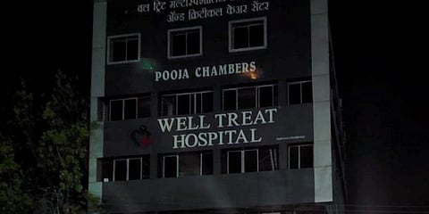 Four people died while several others were injured in a major fire at Well Treat Multispeciality hospital in Nagpur. (Photo | PTI)