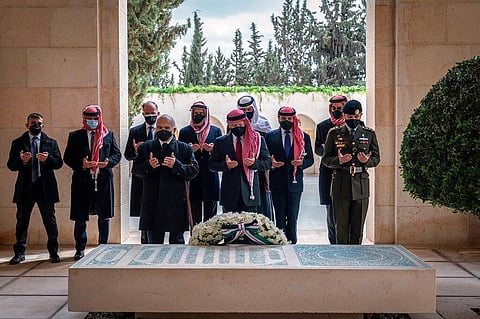 Jordan’s King Abdullah II, center, Prince Hamzah bin Al Hussein, second left, during a visit to the tomb of the late King Hussein, in Amman Jordan, Sunday. (Photo | AP)