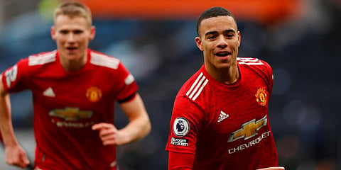 Manchester United's Mason Greenwood celebrates after scoring his side's third goal during the English Premier League match against Tottenham. (Photo | AP)