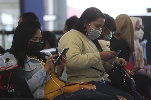 People wear masks at Hong Kong airport in Hong Kong (File photo| AP)