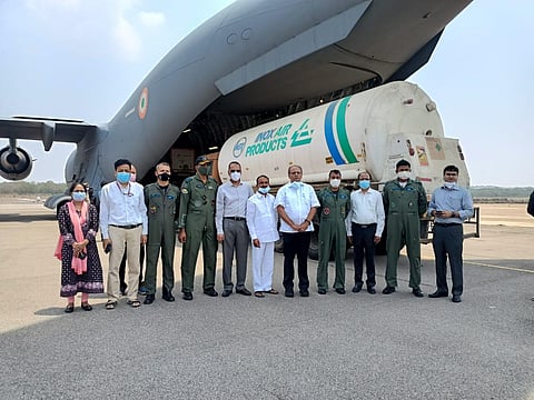 Health Minister Eatala Rajender and Telangana CS  Somesh Kumar oversee the sending of empty oxygen tanks from Begumpet Airport to Odisha, to procure oxygen for the state.  (Photo | @KTRTRS)