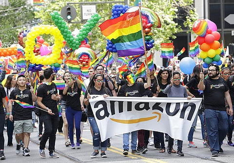 A group with Amazon marches in the Pride parade in San Francisco (Photo | AP)