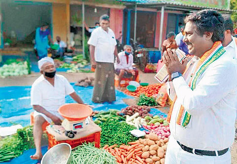 Vijay Vasanth canvassing votes at a market in Kanniyakumari | Express
