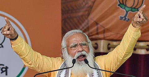 Prime Minister Narendra Modi addresses an election rally in support of his party candidates ahead of the third phase of state assembly polls, in Hooghly. (Photo | PTI)