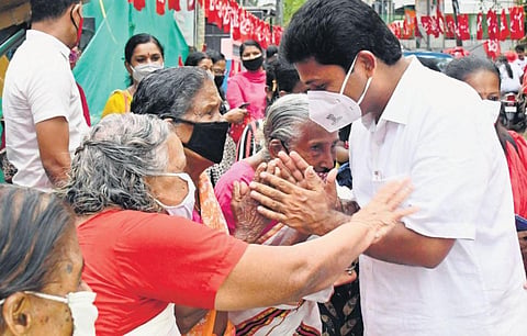 UDF candidate K Babu seeks votes from traders at Tripunithura town