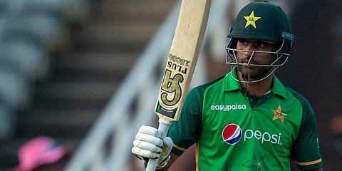 Pakistan batsman Fakhar Zaman raises his bat to celebrate scoring a century during the second ODI match against South Africa at the Wanderers stadium in Johannesburg. (Photo | AP)