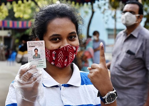 The first time voter discloses the indelible ink mark on her point finger after casting her vote, at SIET College, in Chennai. (Photo | EPS/ P.Jawahar)