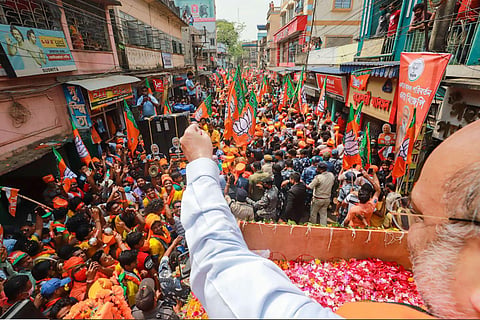 Union Home Minister Amit Shah during a roadshow, in Singur, Wednesday, April 7, 2021. (Photo | ANI)