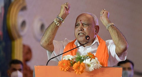 Chief Minister B S Yediyurappa speaks at a rally in Ramdurg, Belagavi, on Wednesday