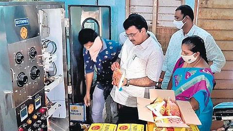 Officials of FSSAI and Vigilance department conduct raids on oil repackaging and manufacturing units in Vijayawada on Wednesday | Express