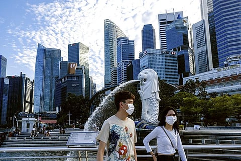 According to Singapore's health ministry guidelines, all people in the island nation aged six and above are required to wear masks as part of the safety measures against COVID-19. (Photo | AP)