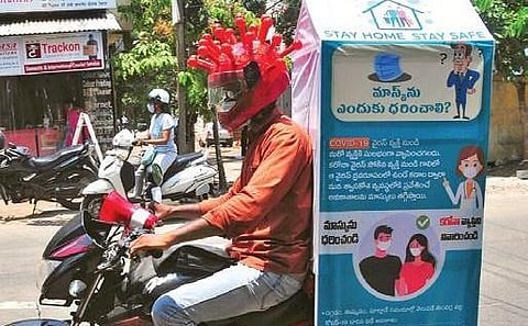 During his ride every day, Durga Prasad plays a recording in own voice on the precautions to be taken to prevent the spread of the deadly virus.