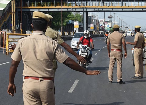 Chennai cops check motorists on GST road and seize the vehicles plying without proper reasons as lockdown is underway on Friday. (Photo | Ashwin Prasath, EPS)