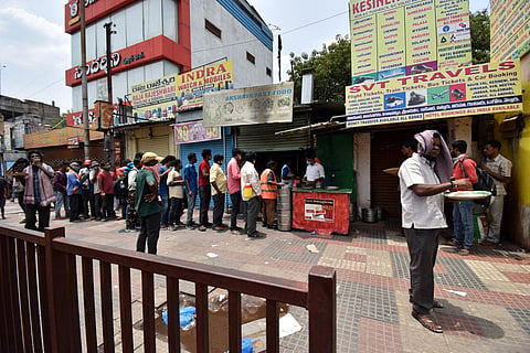 GHMC’s Annapurna Canteen workers distributing food at Secunderabad on Thursday |  S Senbagapandiyan