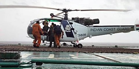 Indian Coast Guard Chetaks launched from Daman have successfully airlifted 10 crew from grounded Barge Gal Constructor. (Photo | ANI) 