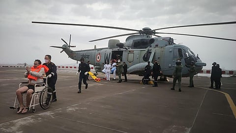 As many as 37 personnel on board the barge are dead and 38 still missing, after Navy personnel, battling extreme weather.  (Photo | AP)