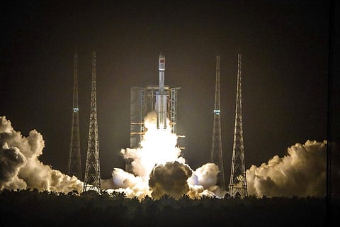 A Long March 7 rocket carrying the Tianzhou-2 spacecraft lifts off from the Wenchang Space Launch Center in Wenchang (Photo | AP)