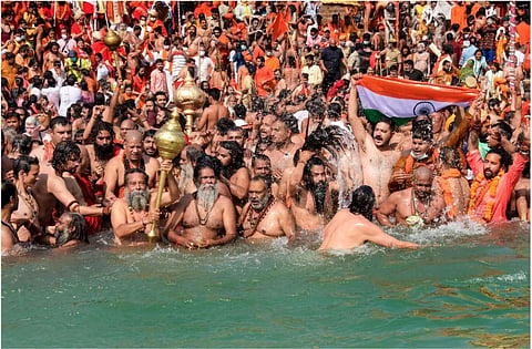 Devotees gather to offer prayers during the third 'Shahi Snan' of the Kumbh Mela 2021, at Har ki Pauri Ghat in Haridwar (Photo | PTI)