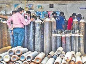 Oxygen cylinders being refilled in Bengaluru on Tuesday | Express