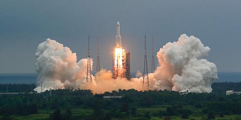 A Long March 5B rocket carrying a module for a Chinese space station lifts off from the Wenchang Spacecraft Launch Site in Wenchang. (Photo | AP)