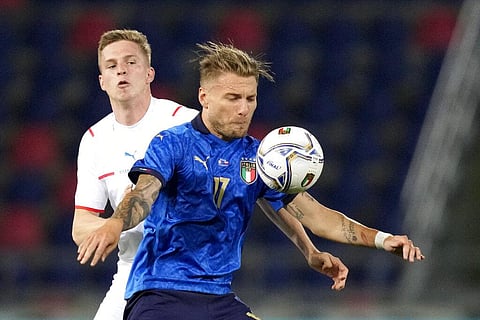 Italy's Ciro Immobile, right, is challenged by Czech Republic's David Zima during the international friendly soccer match between Italy and Czech Republic. (Photo | AP)