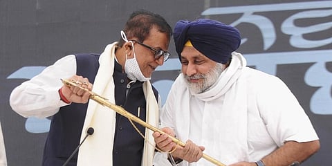 SAD President Sukhbir Singh Badal felicitates BSP Secretary General Satish Chandra Mishra during a press conference at SAD head office in Chandigarh, Saturday, June 12, 2021. (Photo | PTI)